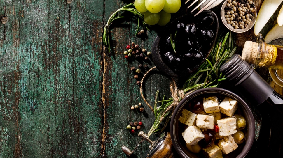 Tasty appetizing italian Mediterranean Food Ingredients Flat Lay on Green Old Rustic Background Top View Copy Space Above