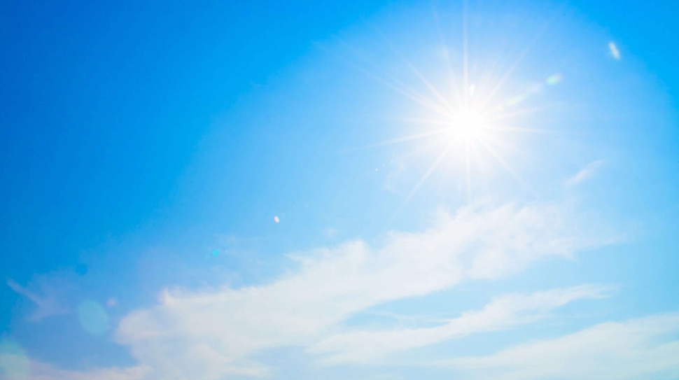 Sun flare on blue sky